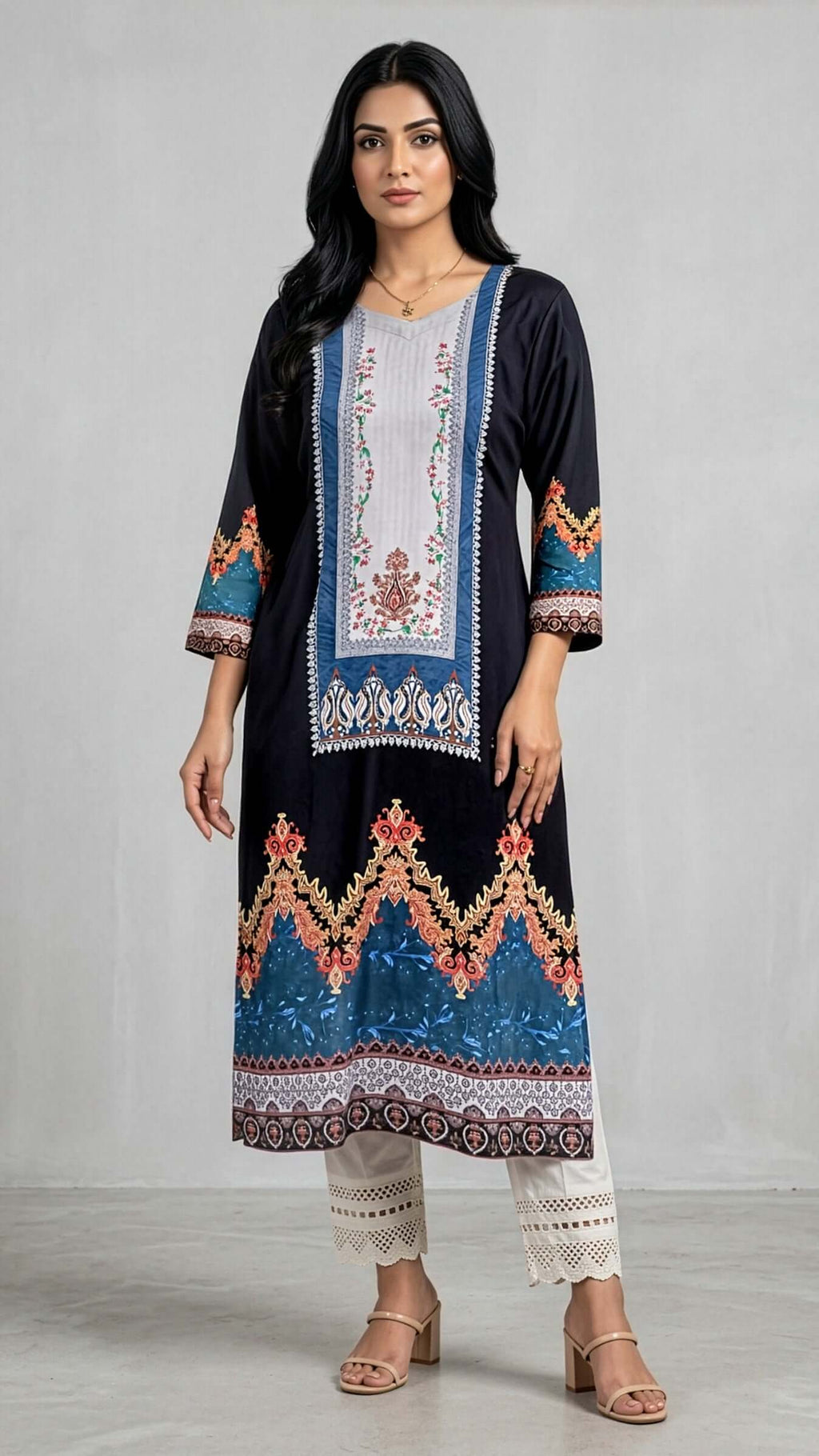 Long Kurti from REET by Bunaiganj featuring intricate embroidery and a flowing silhouette for versatile style.