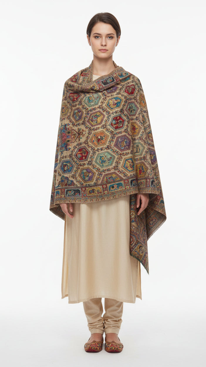 Woman wearing a patterned shawl over a plain outfit on a white background